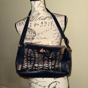 Stylish Navy Shoulder Bag with Cutout Design